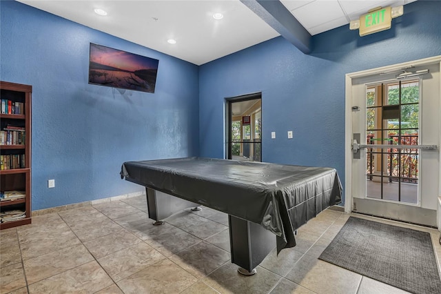 rec room with pool table, tile patterned flooring, and beam ceiling