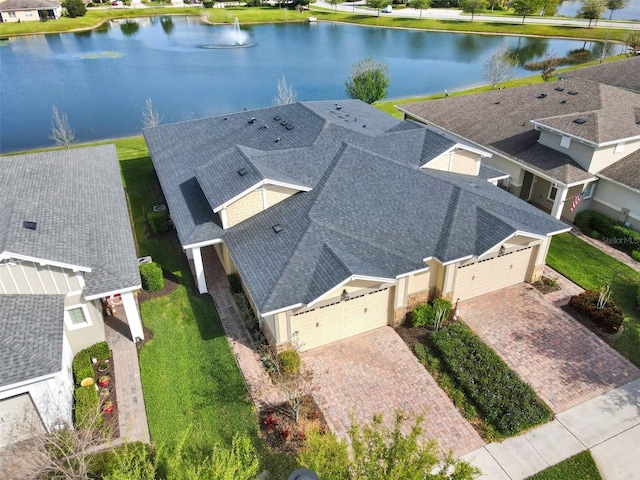 bird's eye view with a water view