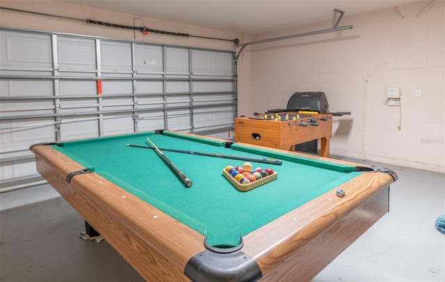 rec room with concrete flooring and billiards