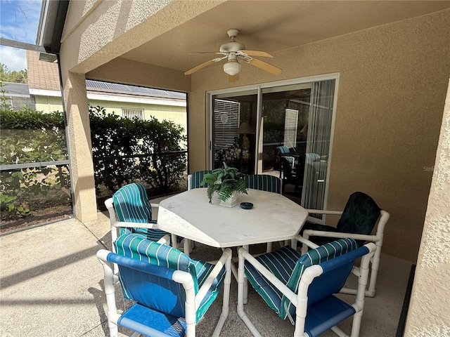 view of patio with ceiling fan