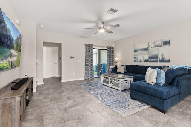 living room featuring ceiling fan