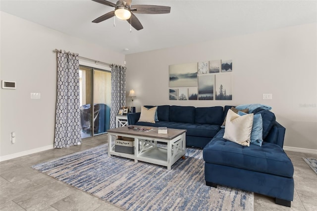 living room featuring ceiling fan