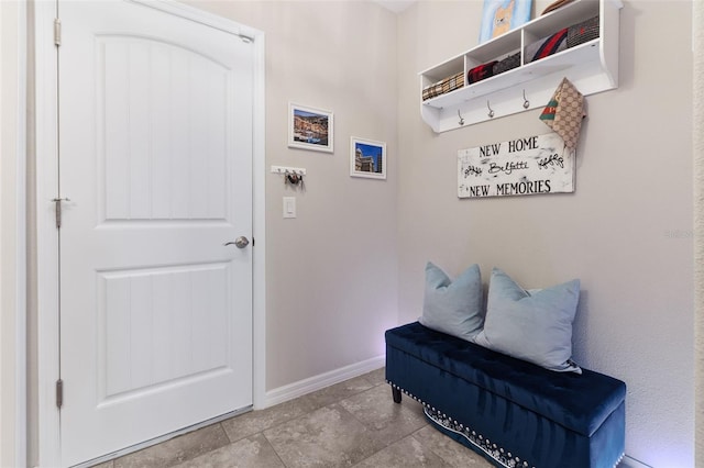 mudroom with light tile patterned flooring