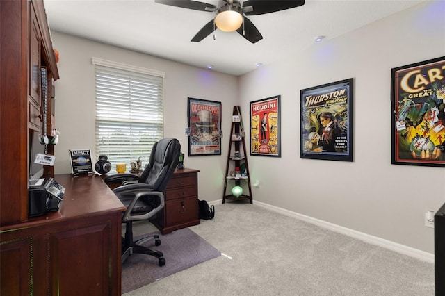 office area featuring ceiling fan and light carpet