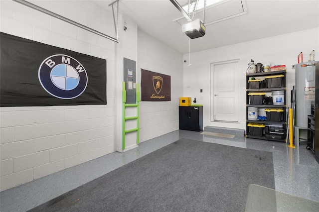 garage with electric water heater and a garage door opener