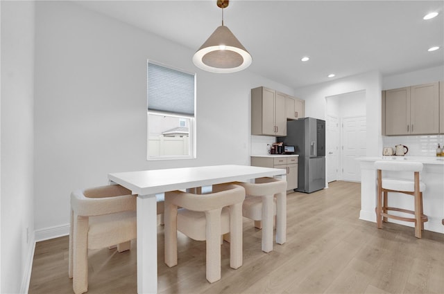 dining room featuring light hardwood / wood-style floors