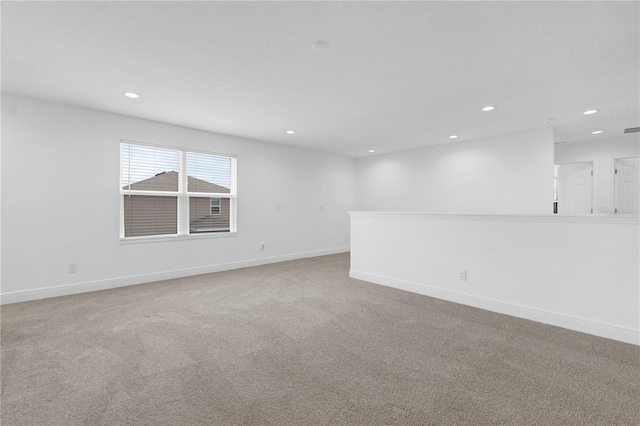 14442 Noto Ave, Clermont, FL 34714 - spare room with recessed lighting and light colored carpet
