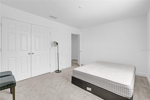 14442 Noto Ave, Clermont, FL 34714 - bedroom featuring light colored carpet and a closet