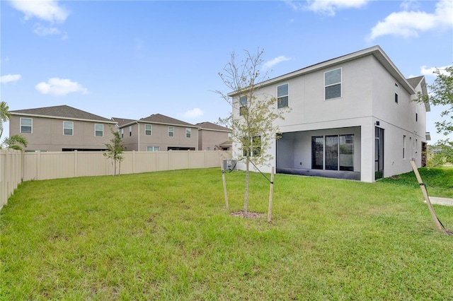 14442 Noto Ave, Clermont, FL 34714 - rear view of property with stucco siding