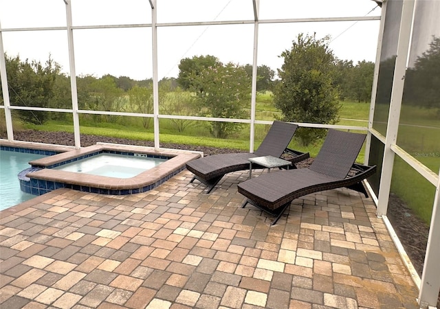 unfurnished sunroom with a jacuzzi