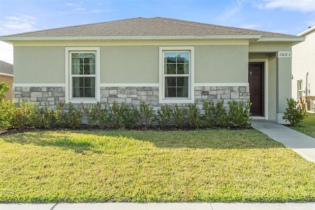 view of home's exterior featuring a yard