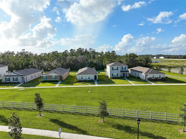 birds eye view of property with a rural view