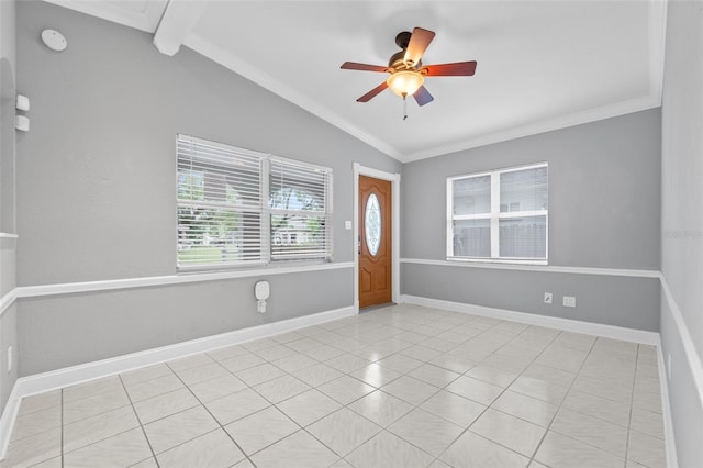 spare room featuring ornamental molding, vaulted ceiling with beams, ceiling fan, and light tile patterned floors