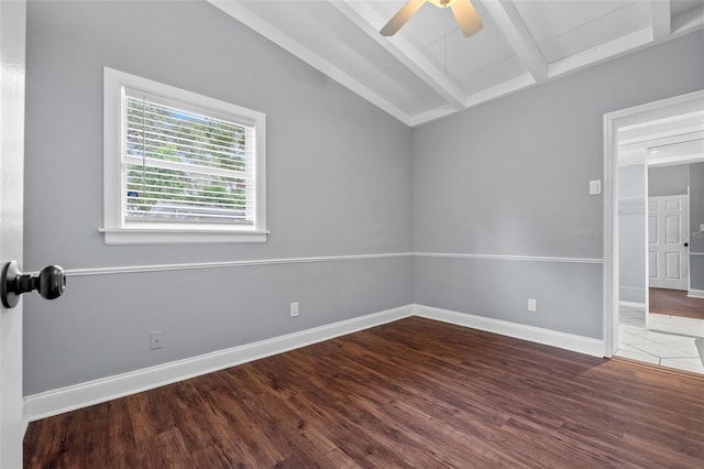 spare room featuring wood-type flooring, vaulted ceiling with beams, and ceiling fan