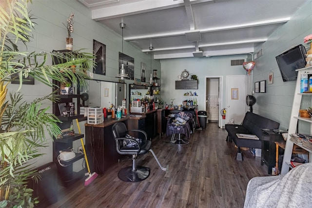 misc room featuring beamed ceiling, bar area, and dark hardwood / wood-style flooring