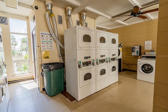 laundry area featuring plenty of natural light, ceiling fan, stacked washer and clothes dryer, and washing machine and clothes dryer