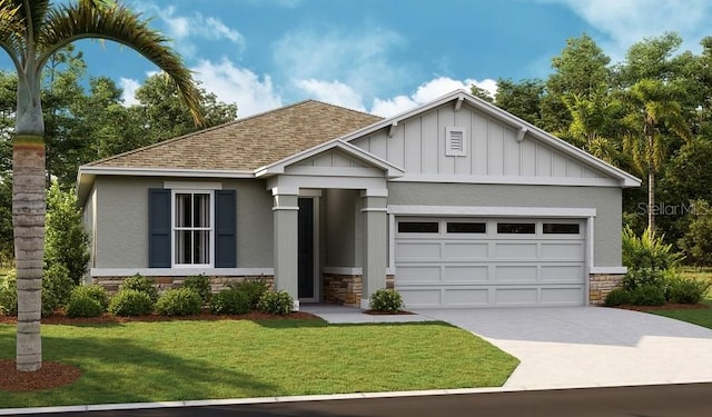 view of front of property featuring a garage and a front yard