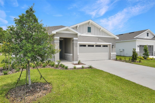 4060 Bannock Ave, Tavares, FL 32778 - craftsman-style home featuring an attached garage, stone siding, board and batten siding, a front yard, and driveway