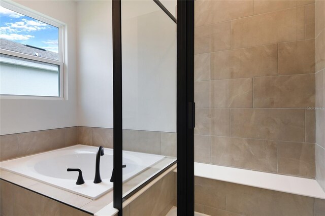 4060 Bannock Ave, Tavares, FL 32778 - bathroom featuring a bath
