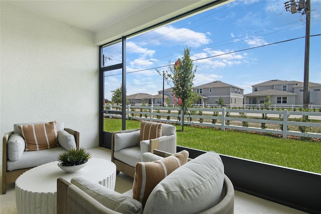 sunroom with a residential view
