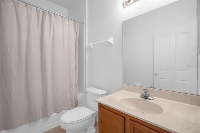 full bathroom with shower / tub combo with curtain, vanity, toilet, and tile patterned floors