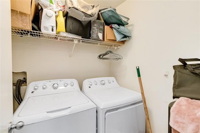 laundry area featuring independent washer and dryer