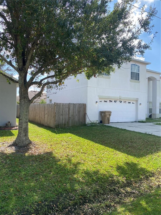 view of yard with a garage