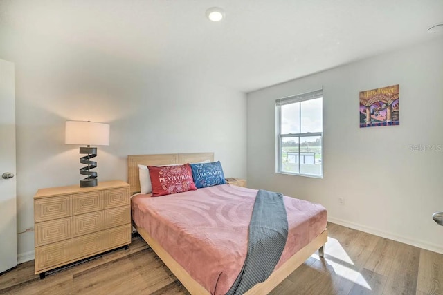 bedroom featuring light hardwood / wood-style floors