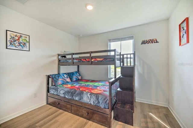 bedroom featuring hardwood / wood-style floors