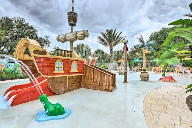709 Benoi Dr, Davenport, FL 33896 - view of jungle gym featuring a patio area