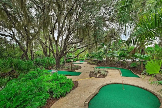 709 Benoi Dr, Davenport, FL 33896 - view of home's community with an area to practice putting