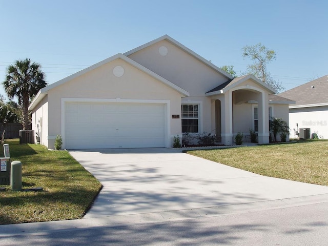 single story home featuring central AC unit, a front yard, and a garage