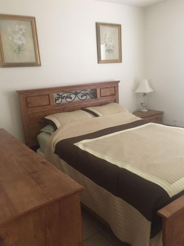 bedroom with tile patterned flooring