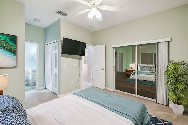 540 Genoa Dr, Poinciana, FL 34759 - bedroom featuring light colored carpet, ceiling fan, ensuite bath, a closet, and baseboards