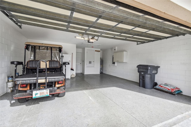 garage featuring a garage door opener and a carport