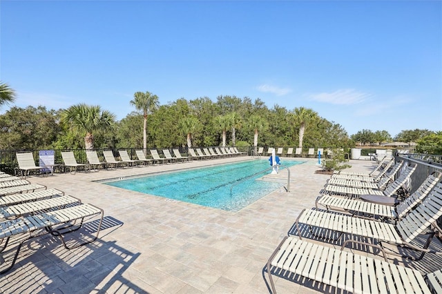 view of swimming pool featuring a patio