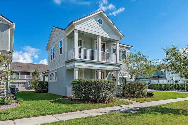 view of front of house featuring central AC unit, a front lawn, and a balcony