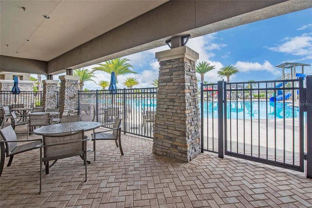 view of patio / terrace with a community pool