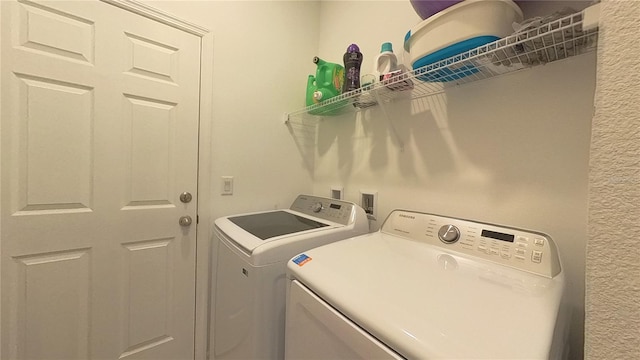 laundry area featuring independent washer and dryer