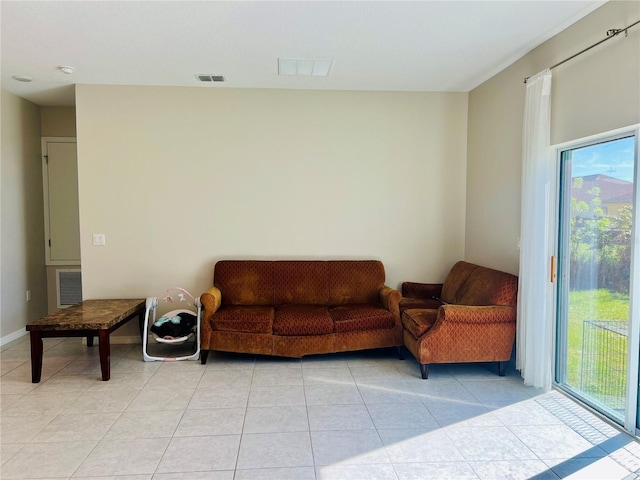 living area featuring light tile patterned floors