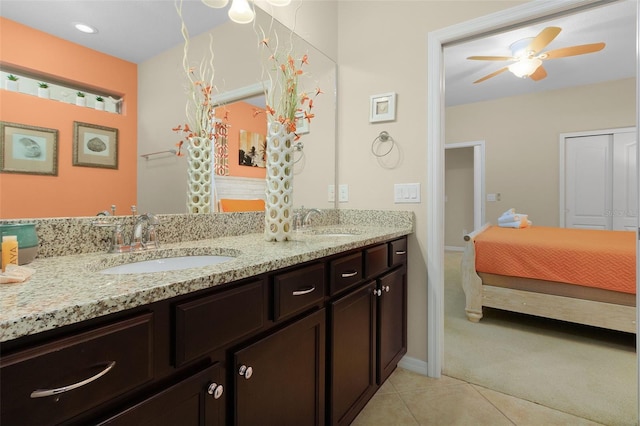 bathroom with vanity, ceiling fan, and tile patterned flooring