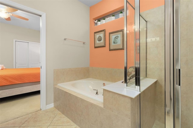 bathroom featuring independent shower and bath and tile patterned flooring