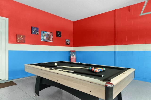 rec room featuring a textured ceiling and pool table