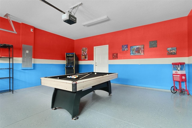 rec room featuring electric panel, a textured ceiling, and billiards