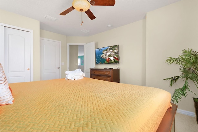 bedroom featuring parquet floors and ceiling fan