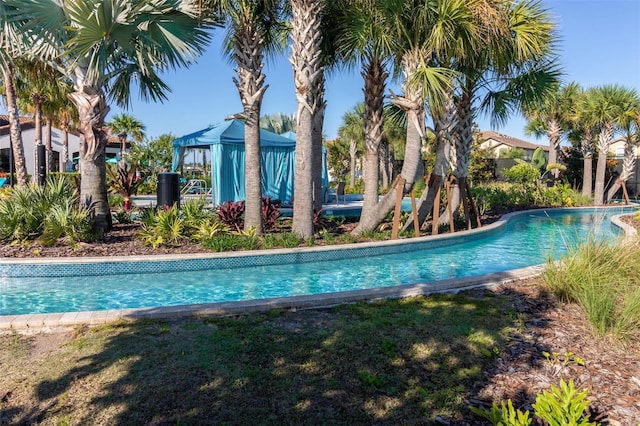 view of swimming pool featuring a gazebo