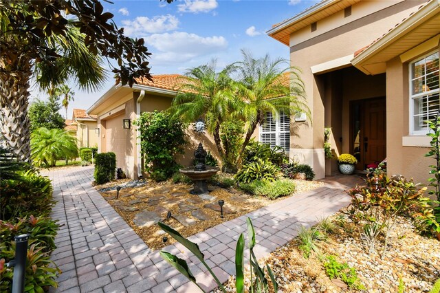 exterior space with a garage