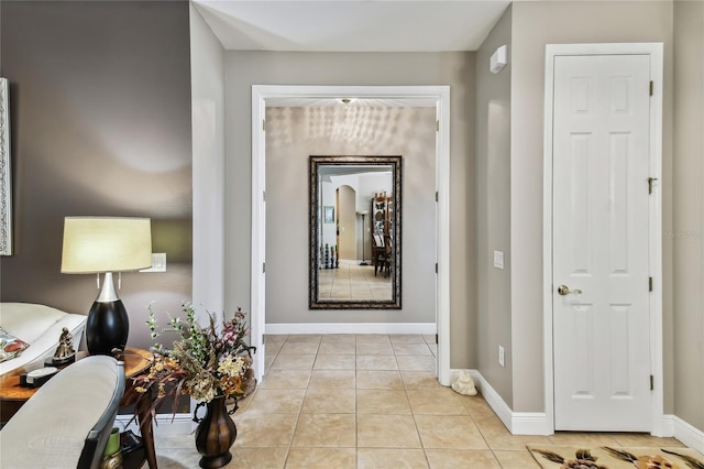 hallway featuring light tile patterned floors