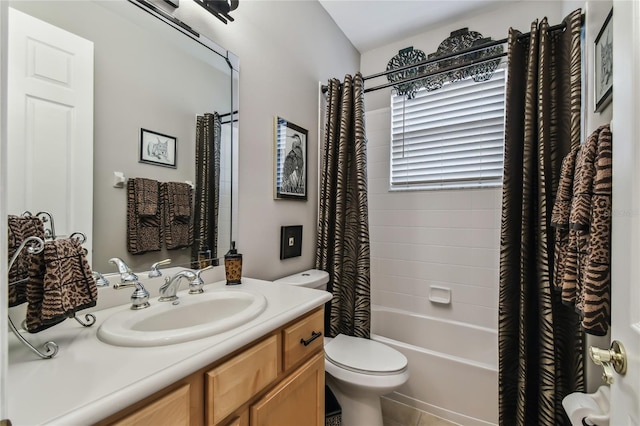 full bathroom featuring shower / bath combo, tile patterned flooring, vanity, and toilet