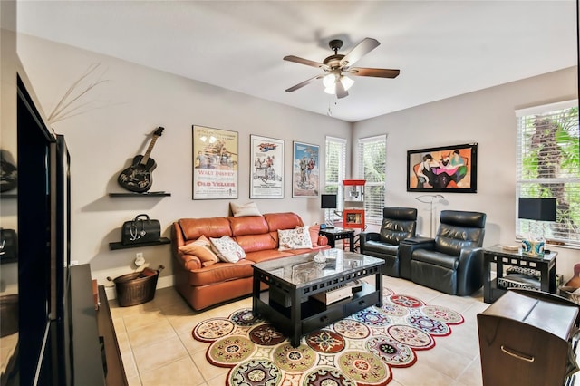 tiled living room featuring ceiling fan